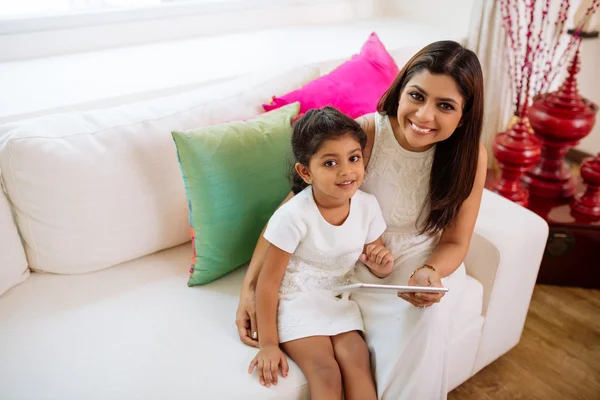 Mother and daughter with digital tablet — Stock Photo, Image