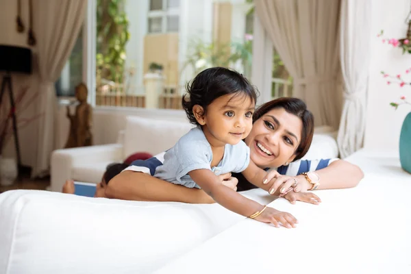 Little girl and beautiful mother — Stock Photo, Image