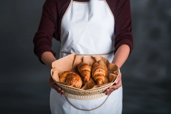 Housewife  with Basket with fresh pastries — Stock Photo, Image