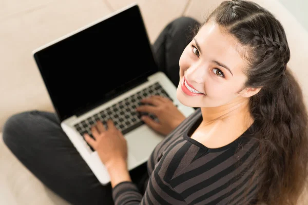 Girl using laptop — Stock Photo, Image