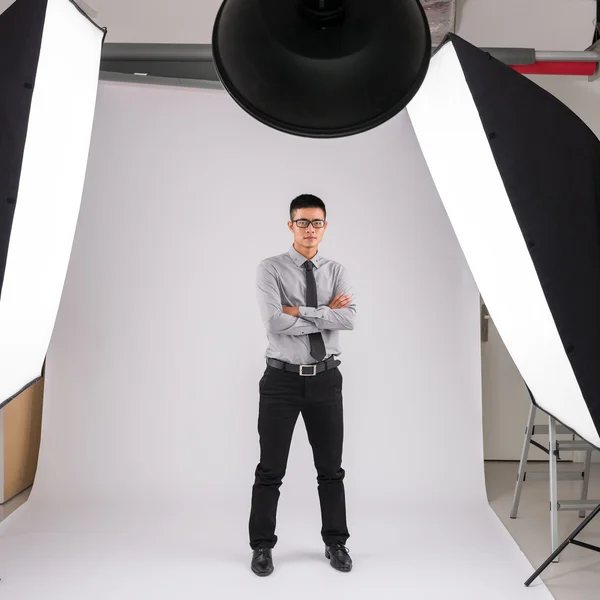 Young man with crossed arms — Stock Photo, Image