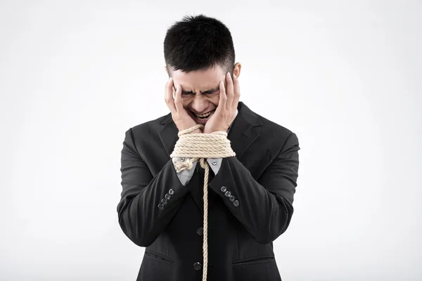 Crying man with chained hands — Stock Photo, Image