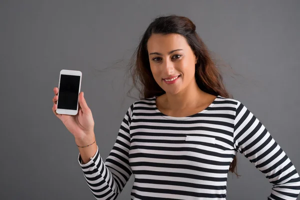 Bir cep telefonu ile güzel kadın — Stok fotoğraf