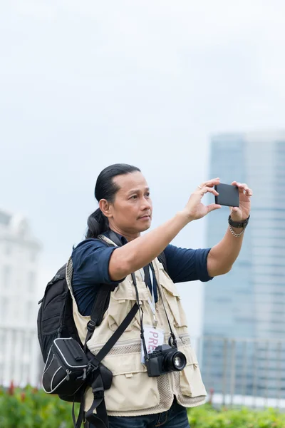 Fotoperiodista tomando fotos —  Fotos de Stock