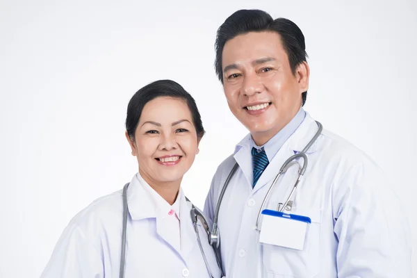 Mature Vietnamese doctors Stock Photo