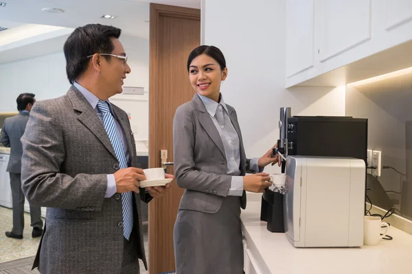 Business colleague having coffee break