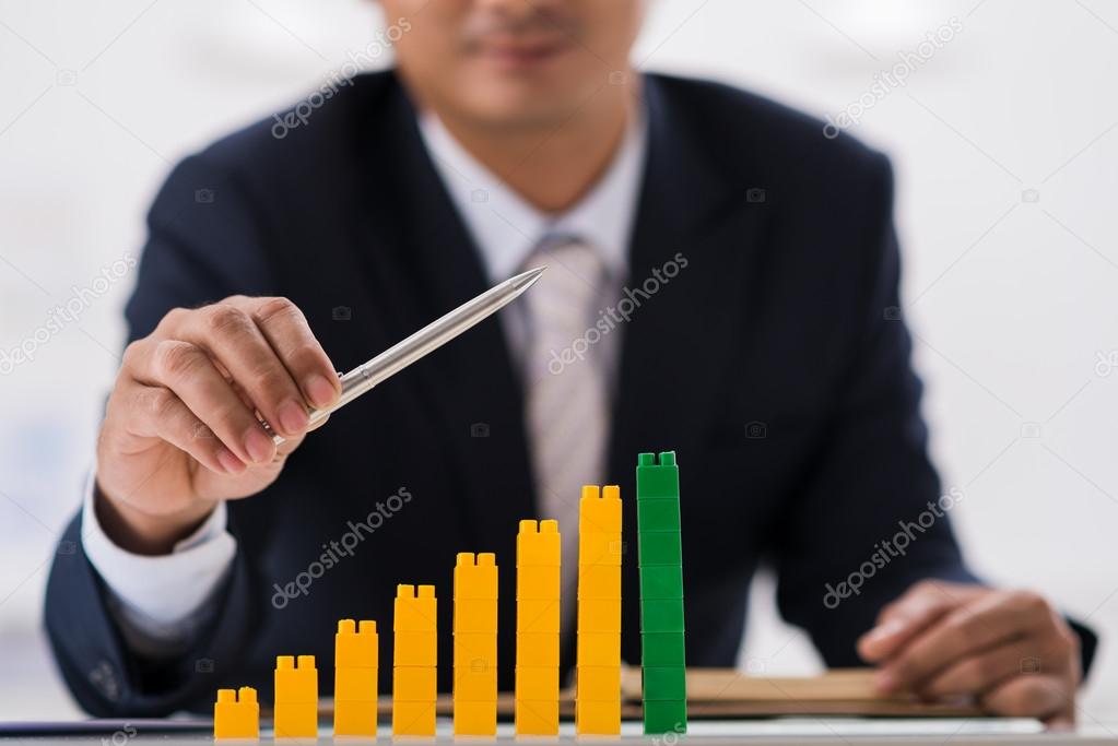 businessman with increasing chart
