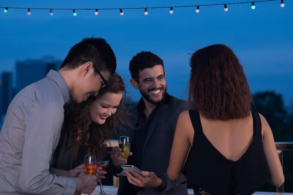 Man sharing funny video with friends — Stock Photo, Image