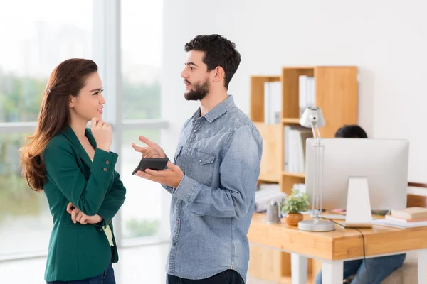 Asian woman receiving financial advice