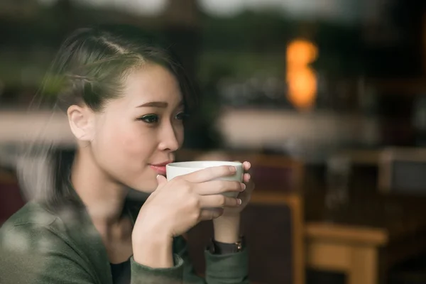 Lady drinking hot tea — Stock Photo, Image