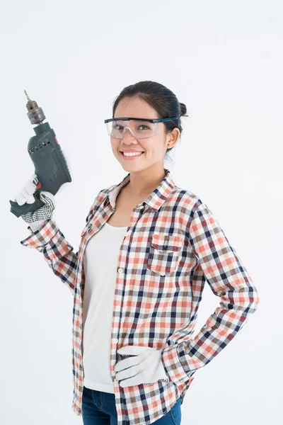 Mujer con taladro de mano — Foto de Stock