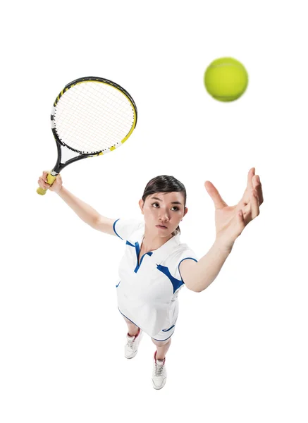 Woman serving tennis ball — Stock Photo, Image