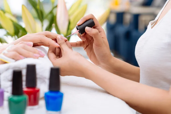 Woman getting manicure — Stock Photo, Image