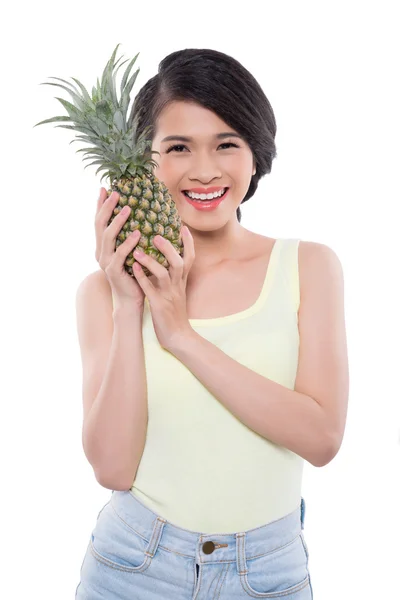 Girl with ripe pineapple — Stock Photo, Image