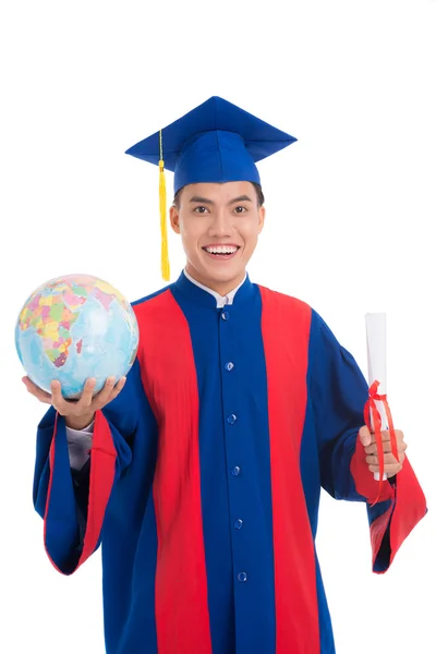 High school graduate with globe and certificate — Stock Photo, Image