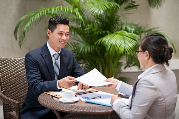 Business colleagues working with papers — Stock Photo, Image