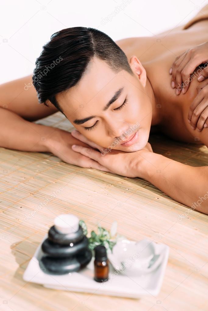 man enjoying  professional massage