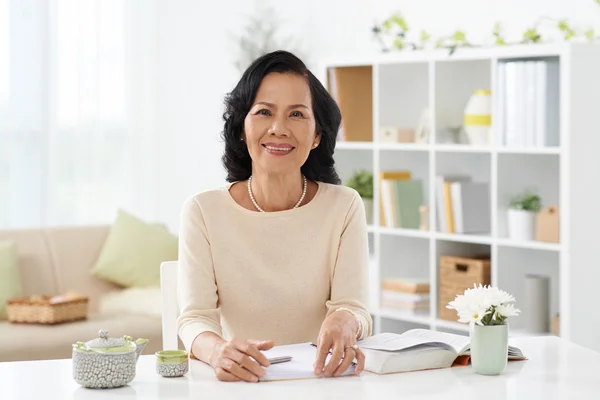 Senior Asian lady working at home — Stock Photo, Image