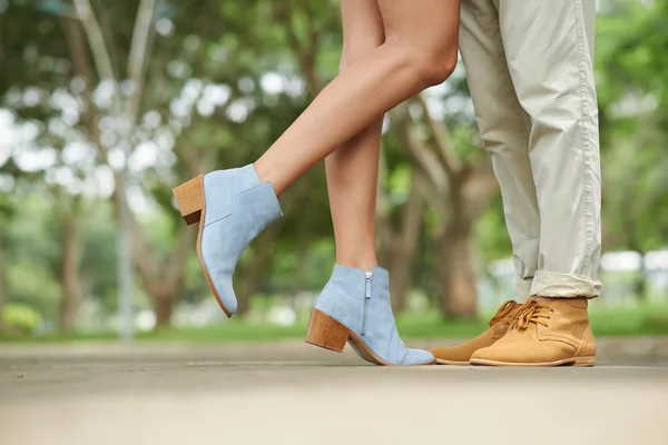 Legs of couple in the park — Stock Photo, Image