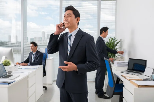 Businessman and his clones in the office — Stock Photo, Image