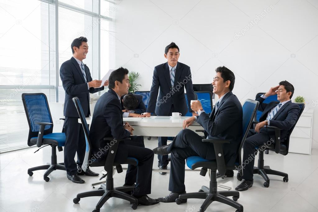 Man having business meeting with his clones
