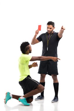 Football player disagree with the red card clipart