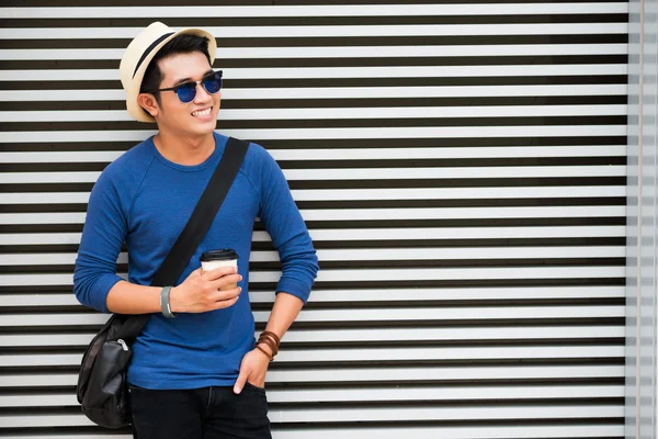 Cheerful man with take-out coffee — Stock Photo, Image