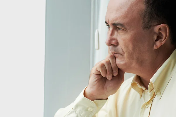 Contemplating mature man — Stock Photo, Image