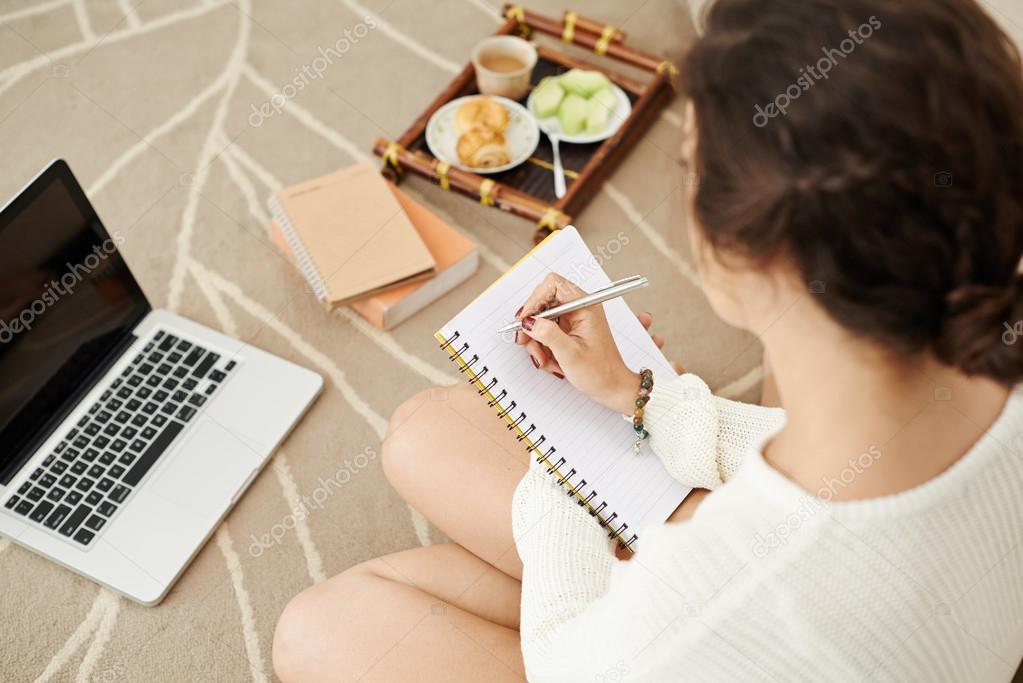 Female student making notes