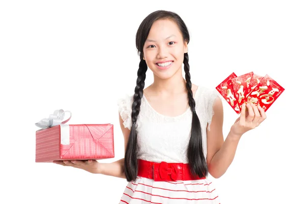 Teenage girl with gift and greetings — Stock Photo, Image