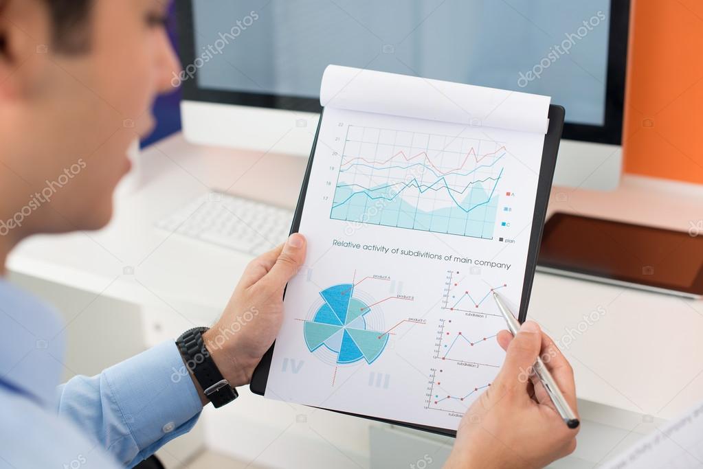 Businessman Examining diagram