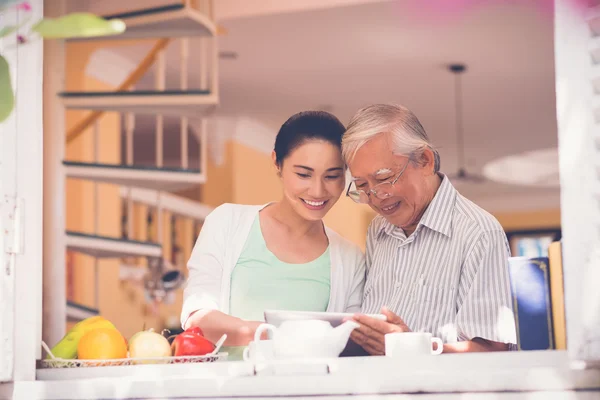 Watching photos together — Stock Photo, Image