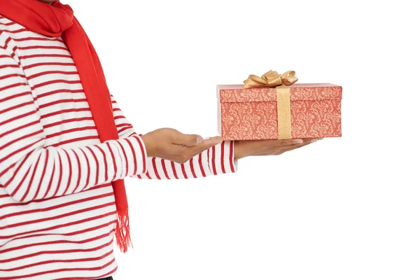 Man showing Christmas present — Stock Photo, Image