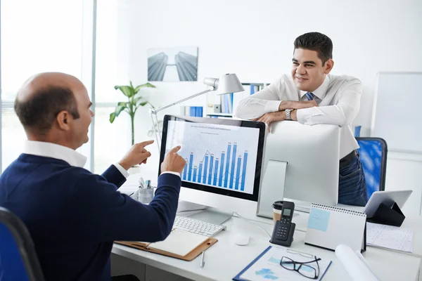 Businessman Chatting with his colleague — Stock Photo, Image