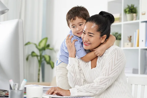 Little boy hugging his mom — Stock Photo, Image