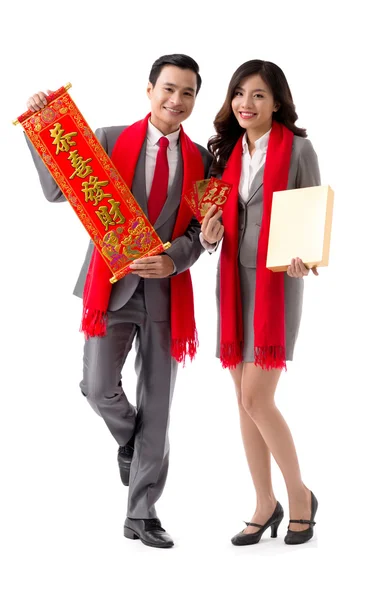 Couple with chocolate box and scroll — Stock Photo, Image