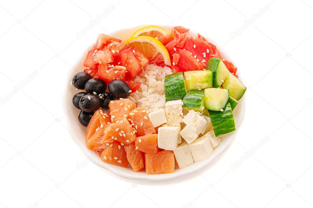 Poke with salmon, olives, feta cheese and vegetables. In a white plate. Close-up. View from above. Isolated