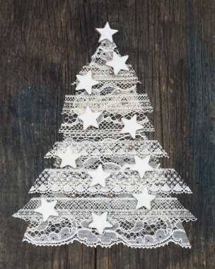 Beautiful conceptual Xmas tree made of white lace