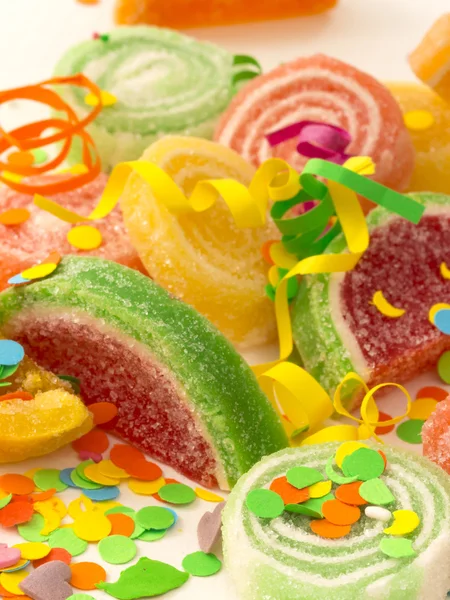Candies with confetti — Stock Photo, Image