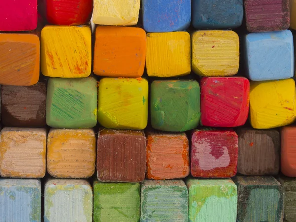 Kolorowe kredki utworzyć streszczenie tło — Zdjęcie stockowe