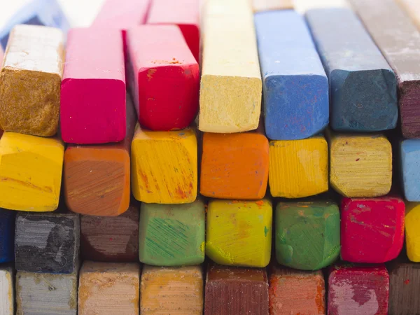 Colorful crayons create abstract background — Stock Photo, Image
