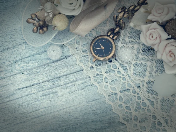 Old female clock on the lace — Stock Photo, Image