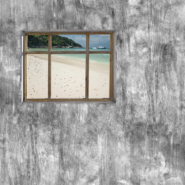 windows frame on cement wall and view of seascape