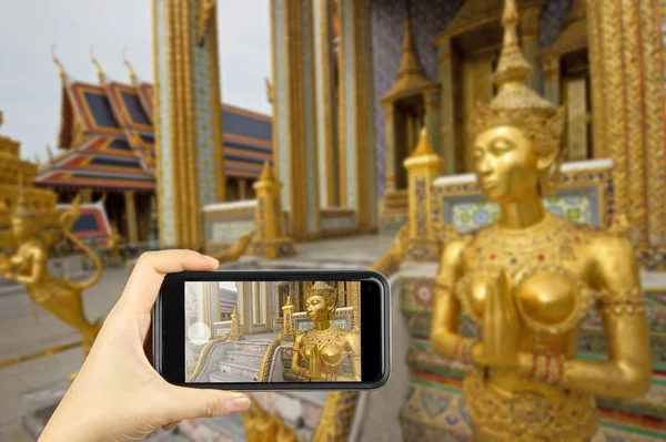 Wat Phra Kaew royal palace, Bangkok, Thailand. Taking photo on s