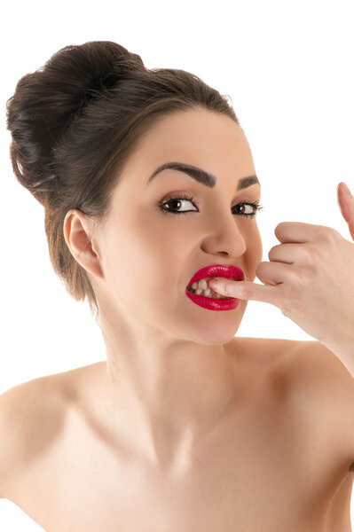 portrait beautiful woman cleaning teeth with your finger