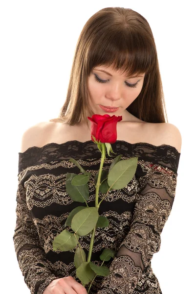 Charming young woman with a red rose — Stock Photo, Image