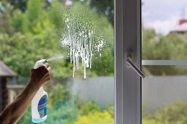 Detergent on the dirty window — Stock Photo, Image