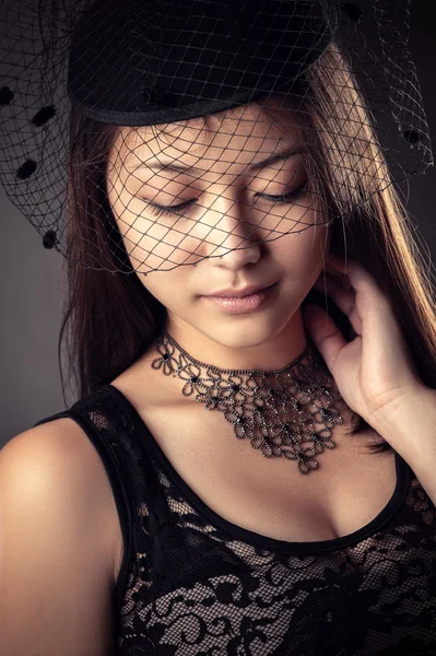 Attractive teenager girl with veiled face — Stock Photo, Image