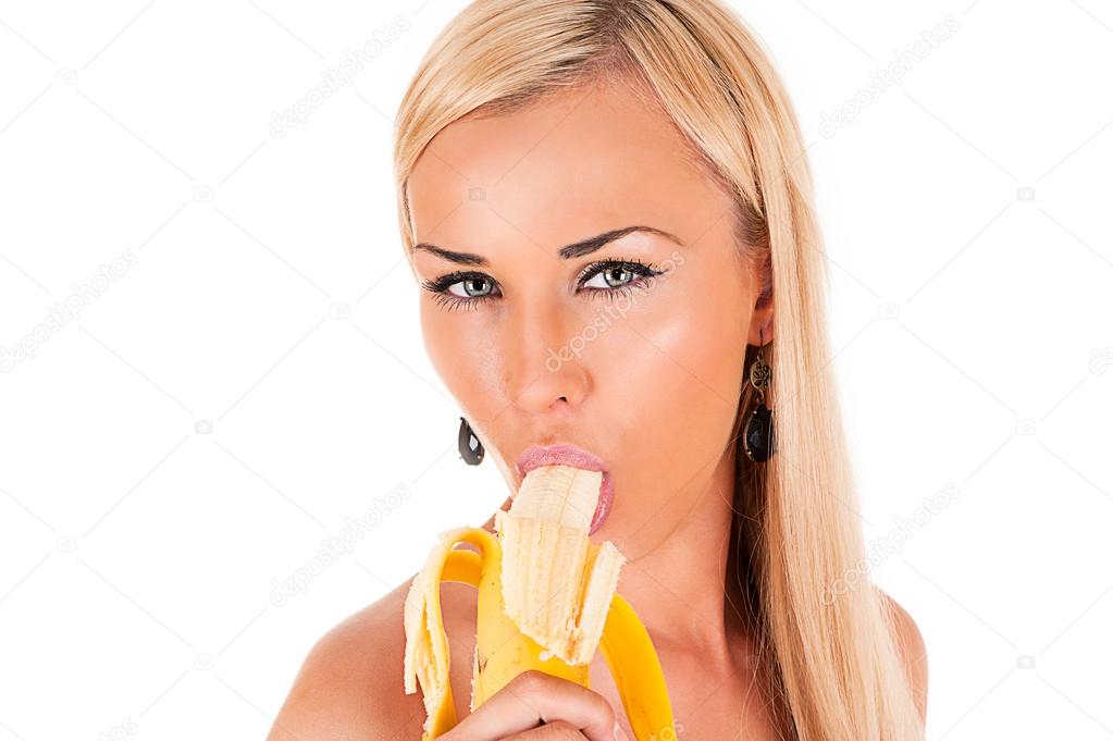 Blond woman sexy eats banana