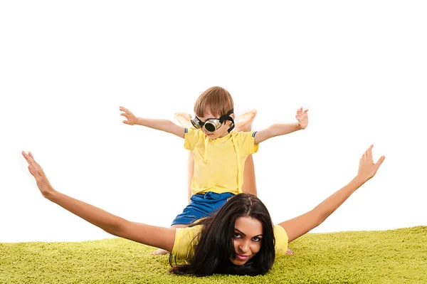 Happy mother and son flying — Stock Photo, Image